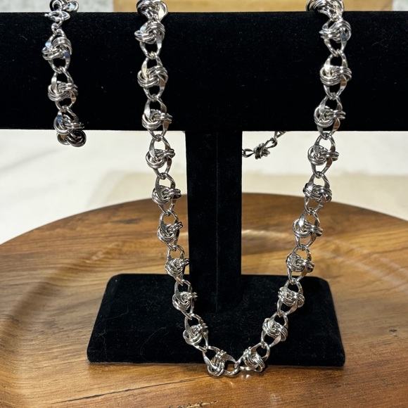 Matching silver tone necklace and bracelet set. - Picture 3 of 7